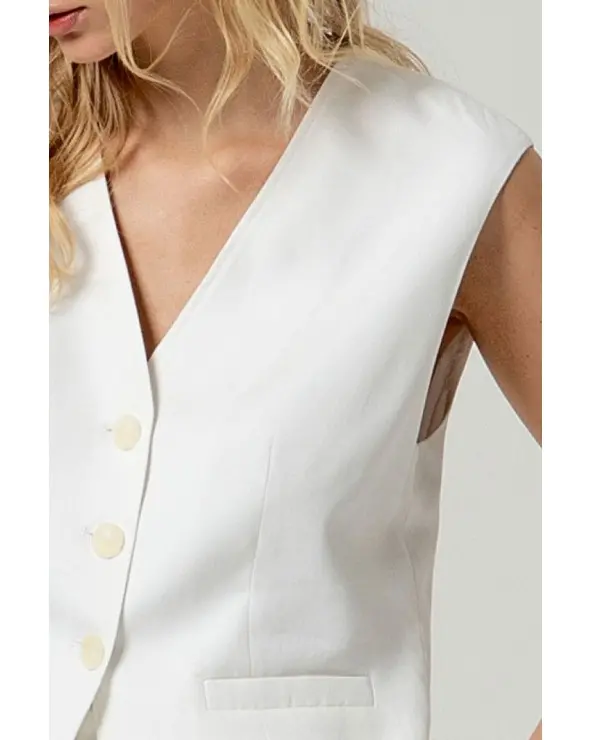 Chaleco Largo Blanco Surkana detalle Esenziashopping Zaragoza